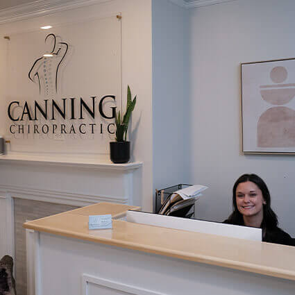 staff smiling at our front desk