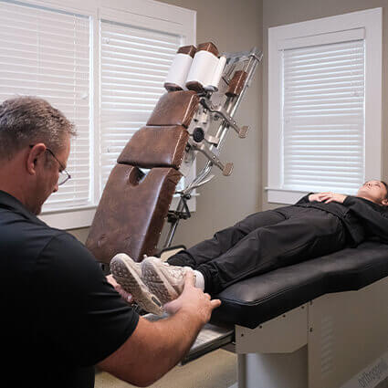patient having feet examined
