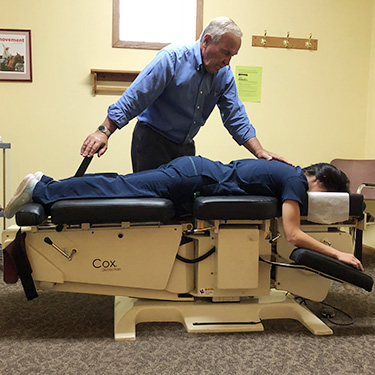 Patient on table with Dr. Jerry