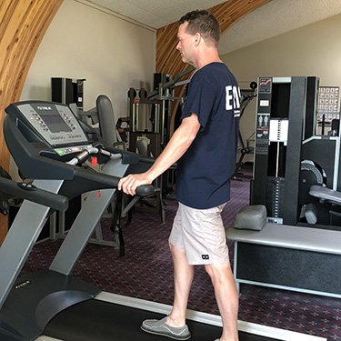 Patient walking on treadmill