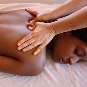 Woman getting massage around spine