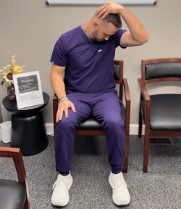 Dr. Minnick demonstrating a neck stretch