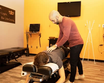 Man on adjusting table