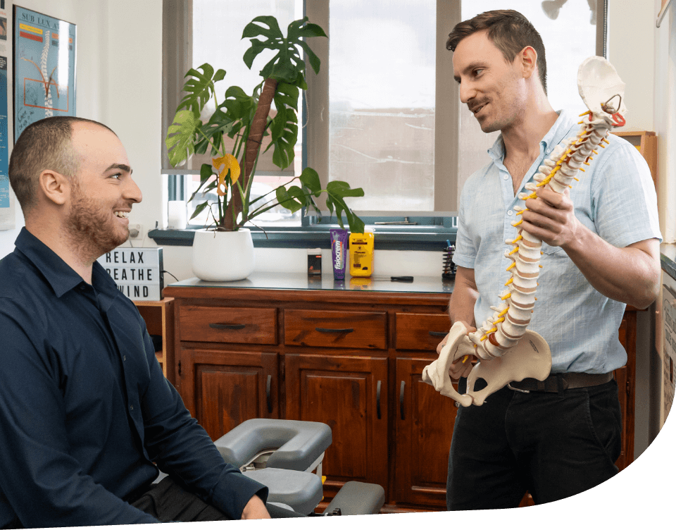 Dr. Silvio explaining spine to patient