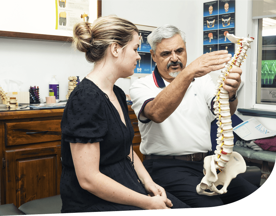 Dr. Silvio explaining spine to patient