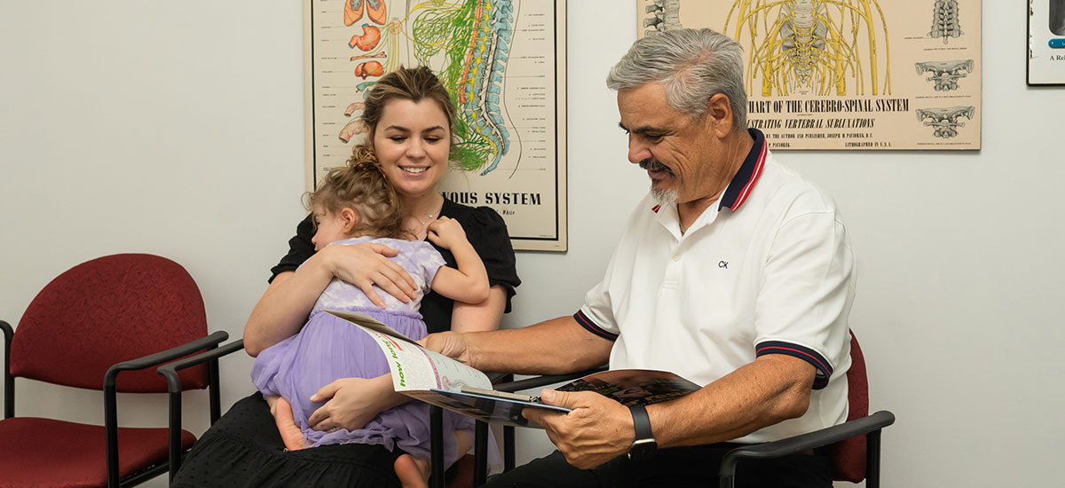 Dr Fico talking with patient