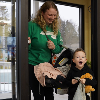 Happy family entering the office