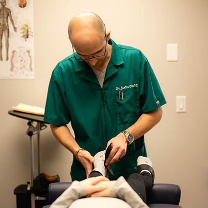 person having foot adjusted