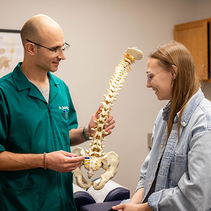 Dr justin talking with patient