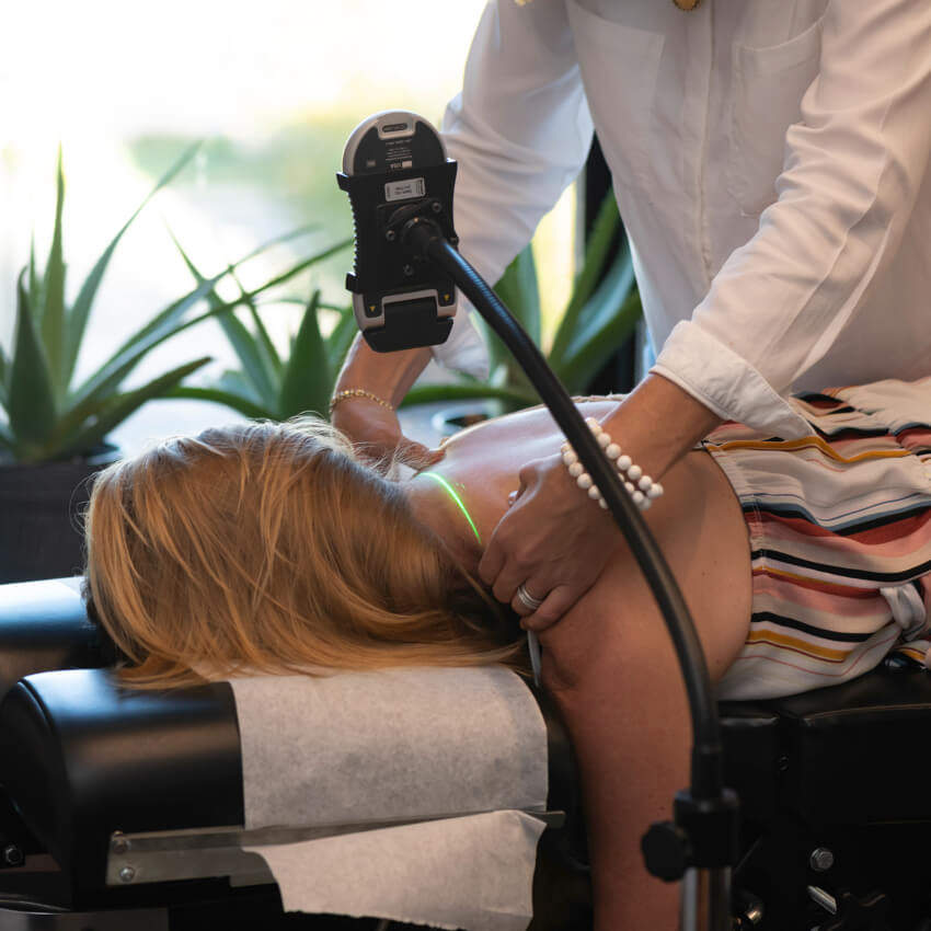 laser being used on patient's back