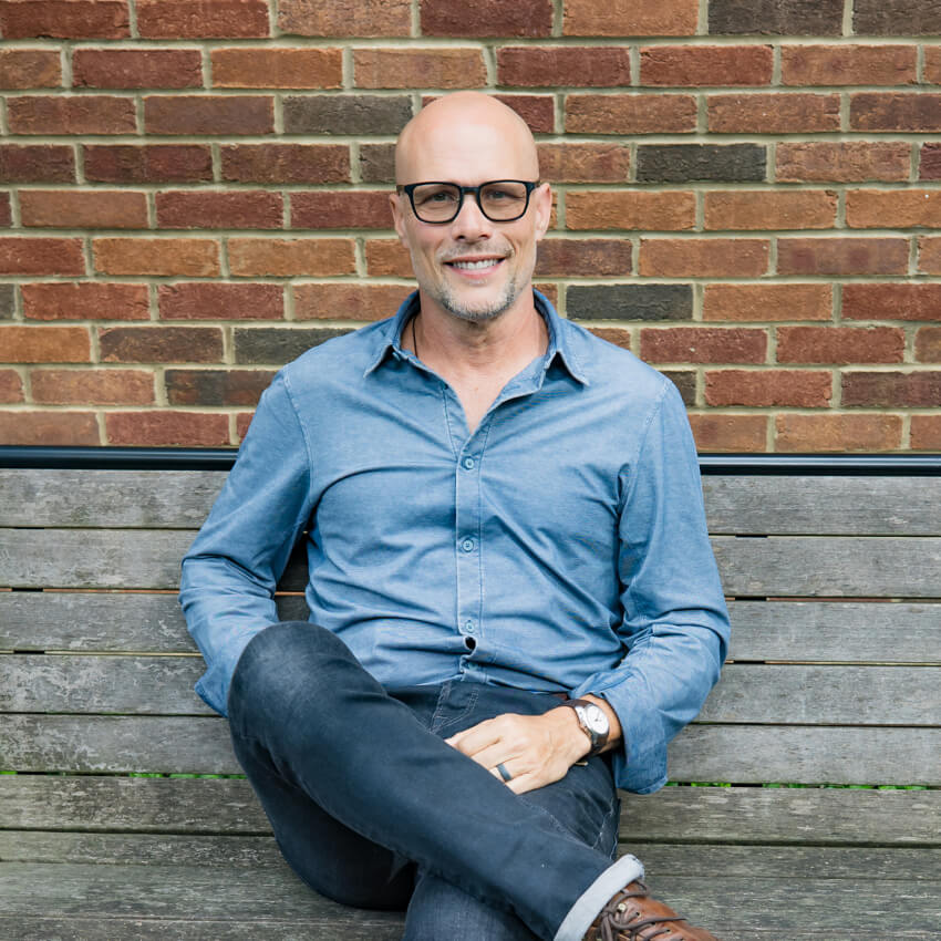 Franklin chiropractor Dr Matt sitting on a bench