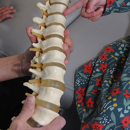 pointing to spine