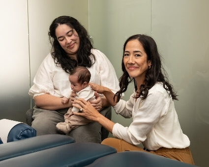 Inglewood chiropractor adjusting infant patient
