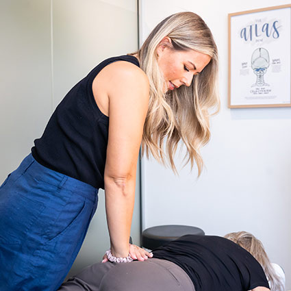 Dr Lauren adjusting patient