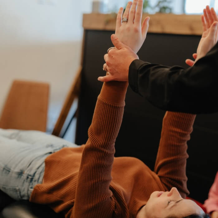 woman with arms up