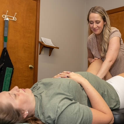 Pregnant woman with doctor