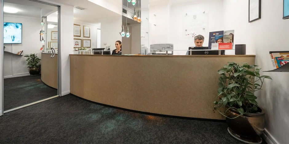 front desk reception with working staff