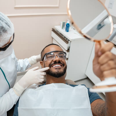 checking-teeth-after-dental-checkup-sq