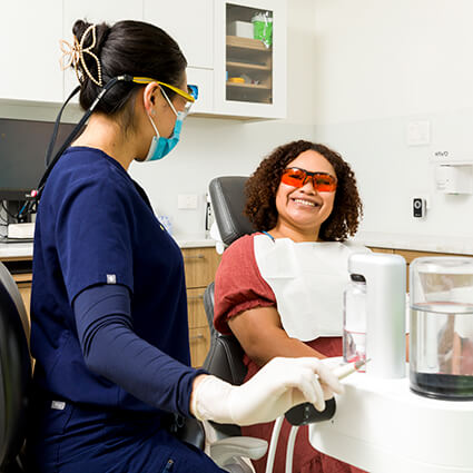 Mai explaining procedure to patient