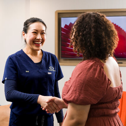 Shaking hands with patient