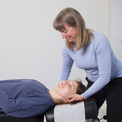 Dr Stacey adjusting patients neck