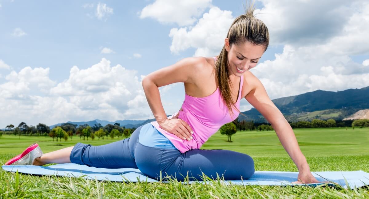 Woman stretching in nature