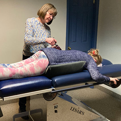 Pregnant patient getting adjustment