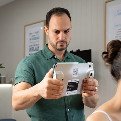 Dr Kassis scanning patient