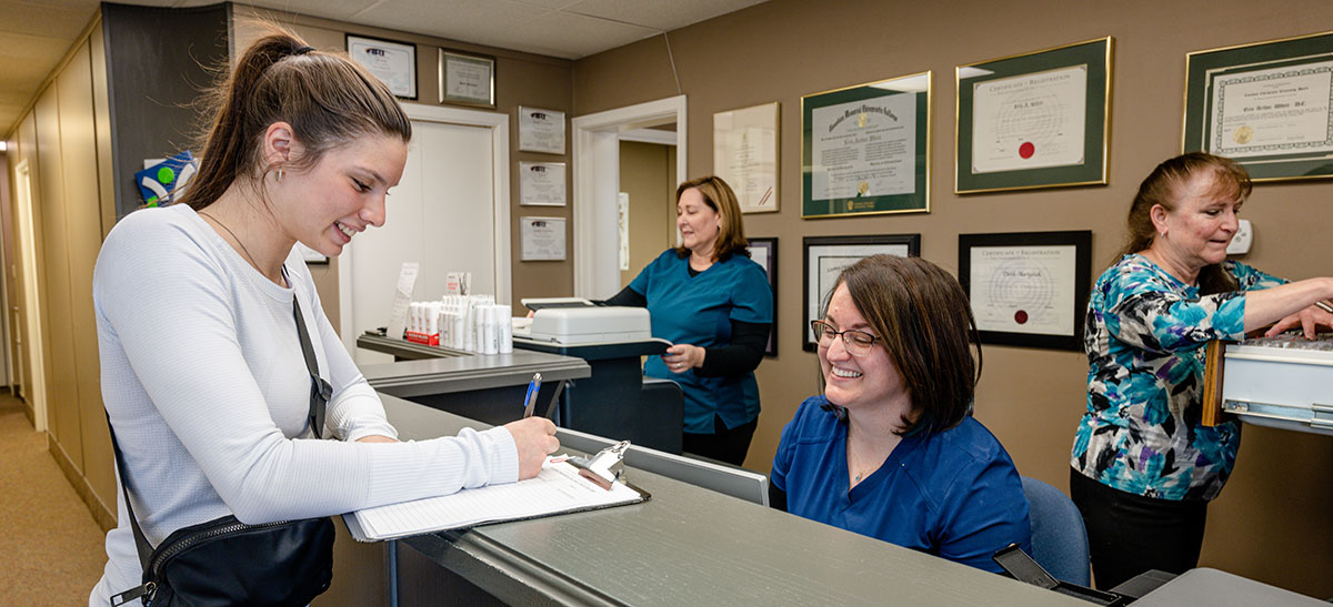 Woman completing paperwork