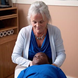 Dr. Karen Adjusting Young Patient