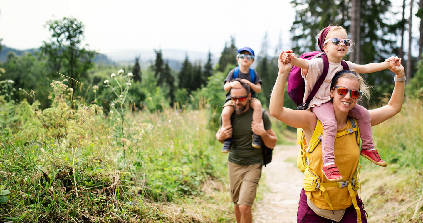 family on a hike outdoors