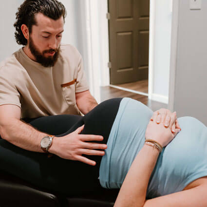 Adjusting pregnant woman