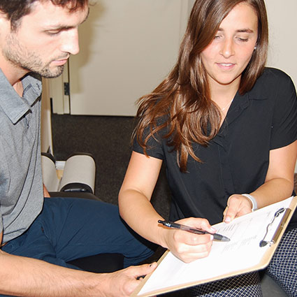 person looking at paperwork