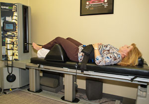 Woman on adjusting table