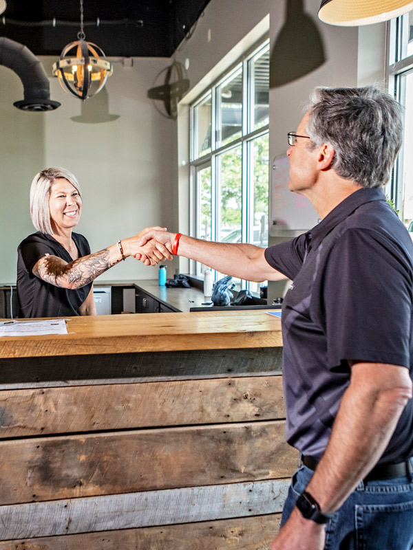 greeting-patient-at-front-desk