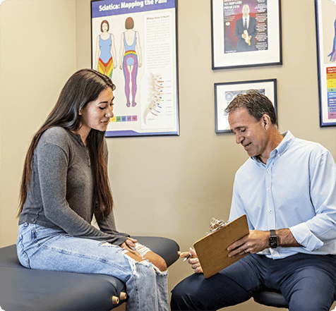 chiropractor talking with patients