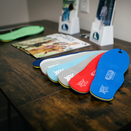 Variety of different colored orthotics