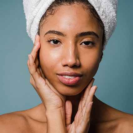 Woman with hair in a towel