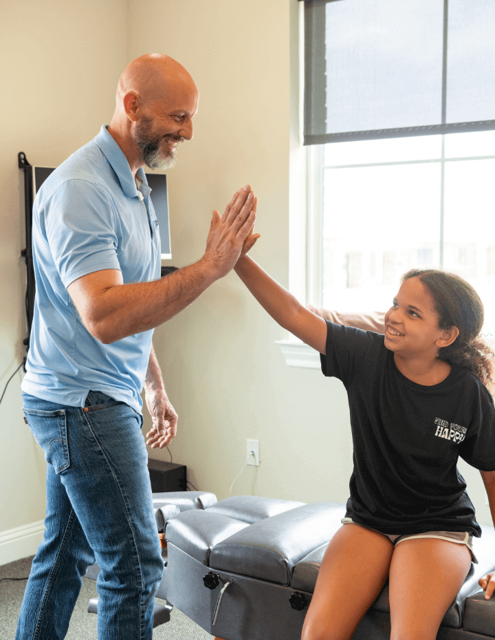 Dr. Matt giving high five