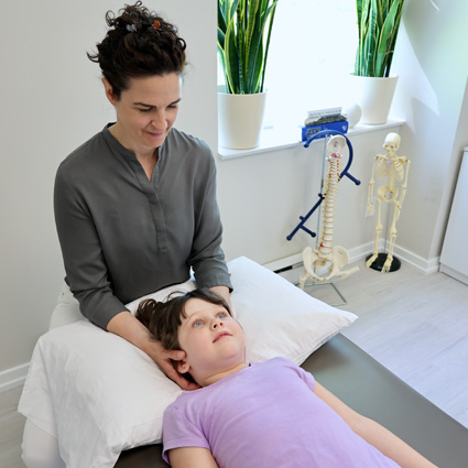 Child receiving osteopathic care