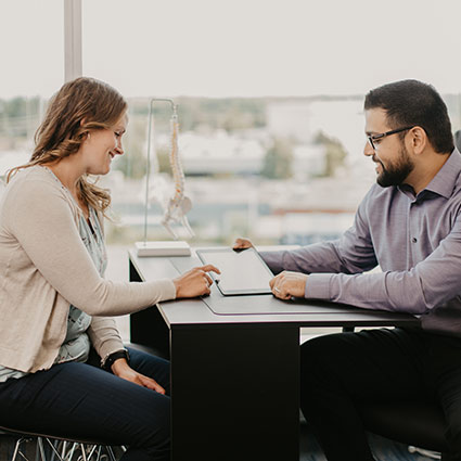 doctor consulting with patients