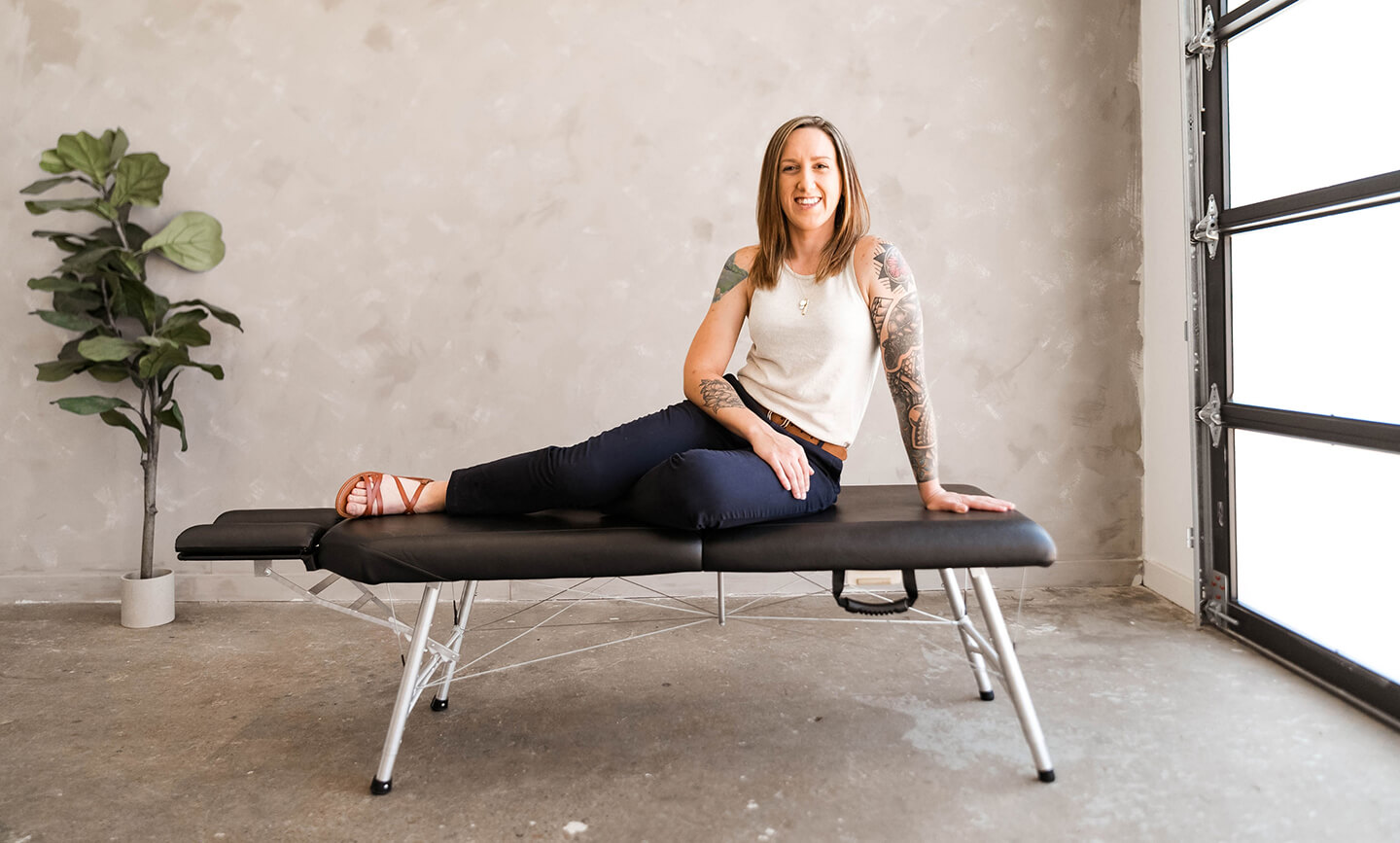 Dr. Brittany Claus on adjusting table