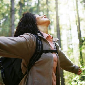 happy woman with arms wide open