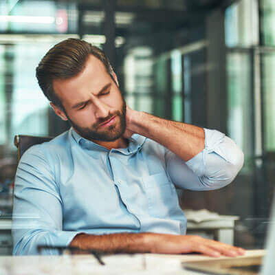 man with neck pain