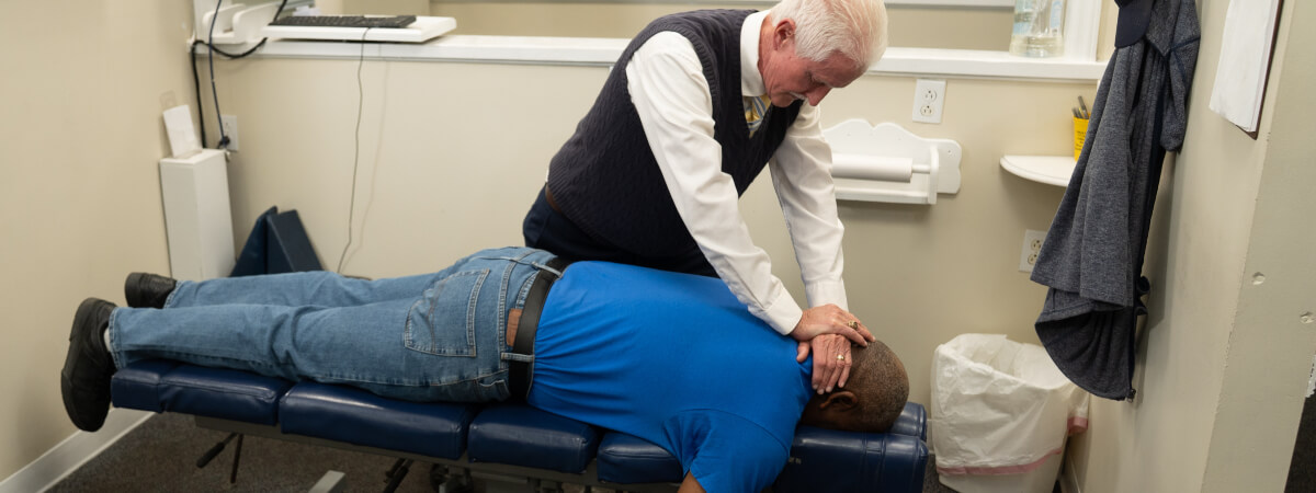 Gaffney chiropractor adjusting a patient's neck