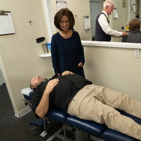 Patient in chiropractic treatment room