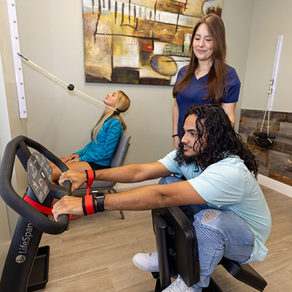 person on exercise machine