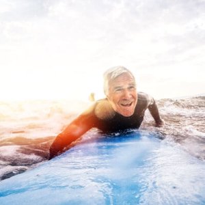 man catching wave