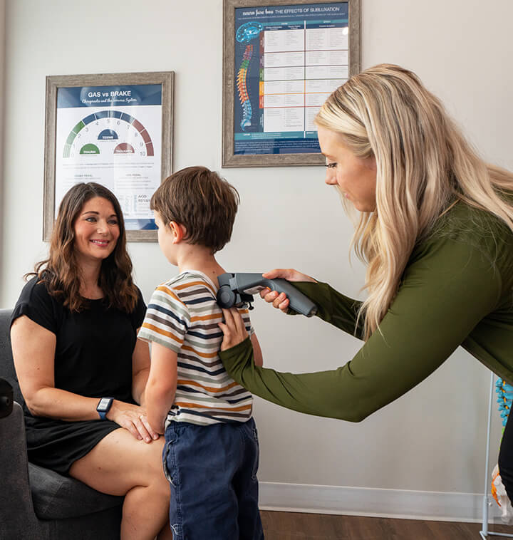 using tool to adjust child's back