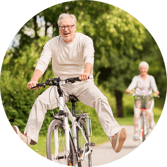 older couple riding bicycles